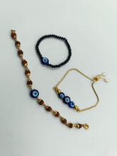 Load image into Gallery viewer, A2 Fashion Evil Eye Rakhi Combo,Set Of 1 Bhai Rakhi,1 Bhabhi Rakhi And 1 Kid Rakhi Bracelet