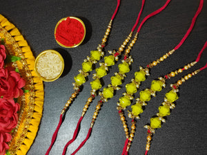 A2 Fashion Yellow Beaded Thread Rakhi (Set Of 6)