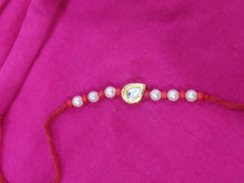 Load image into Gallery viewer, Elegant Kundan And Pearl Rakhi (Set of 4 Rakhi)