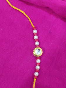 Elegant Kundan And Pearl Rakhi (Set of 4 Rakhi)