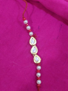 Elegant Kundan And Pearl Rakhi (Set of 4 Rakhi)