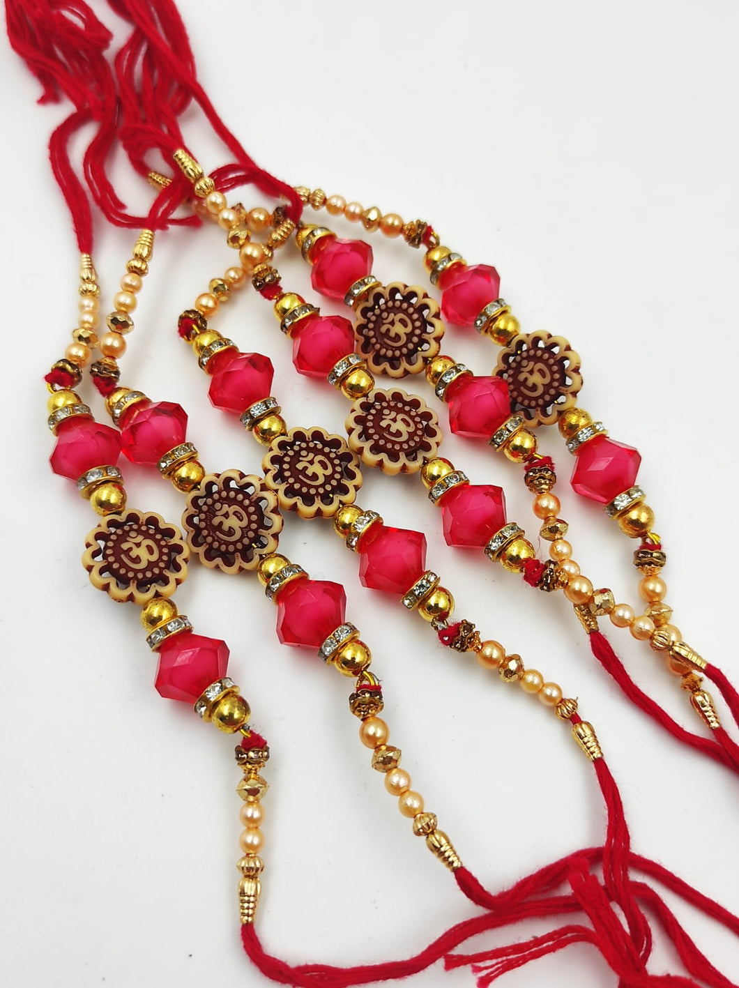 A2 Fashion Wooden Plated Om Beaded Rakhi